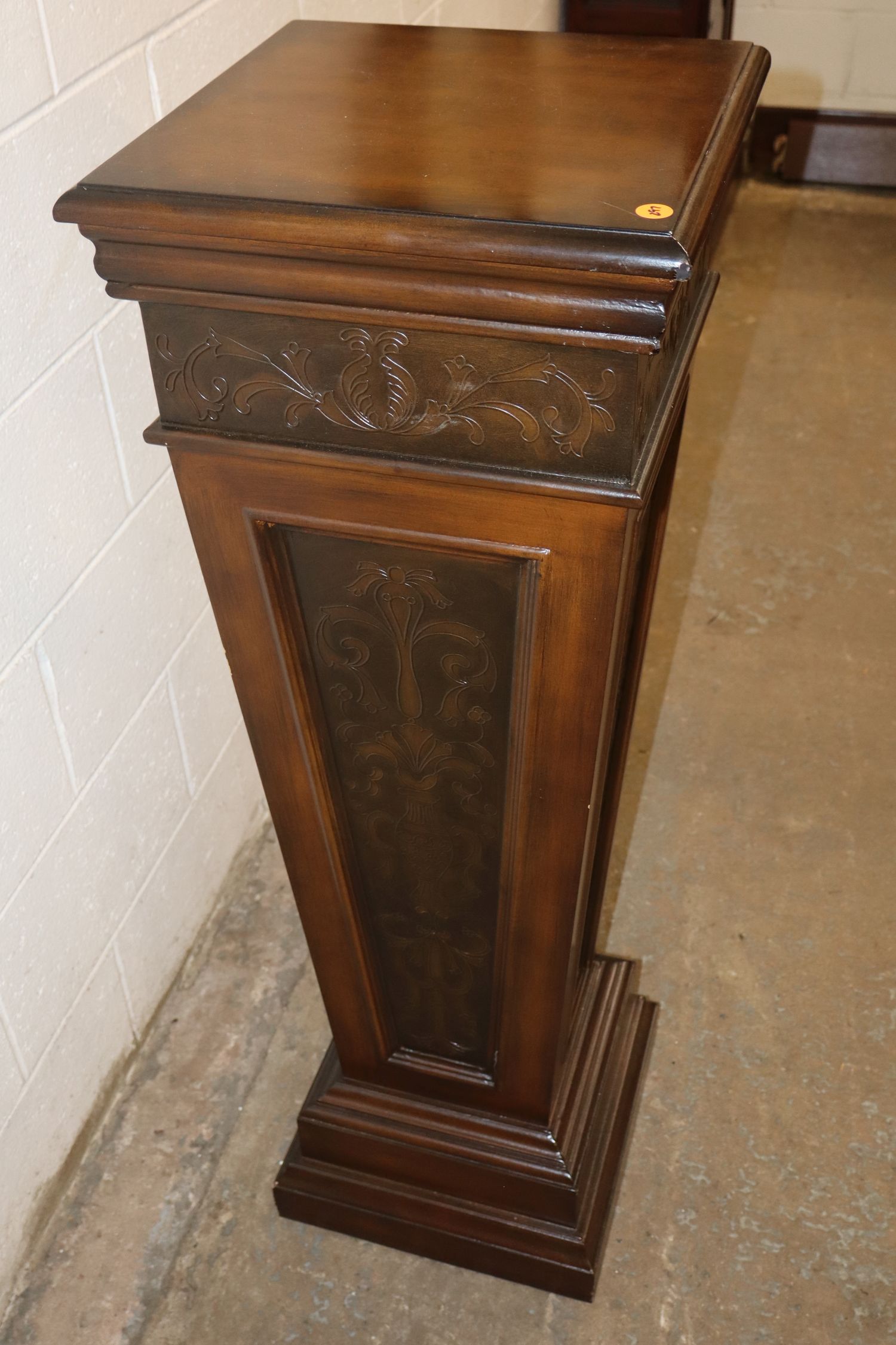 Mahogany pedestal with stamped decoration accents