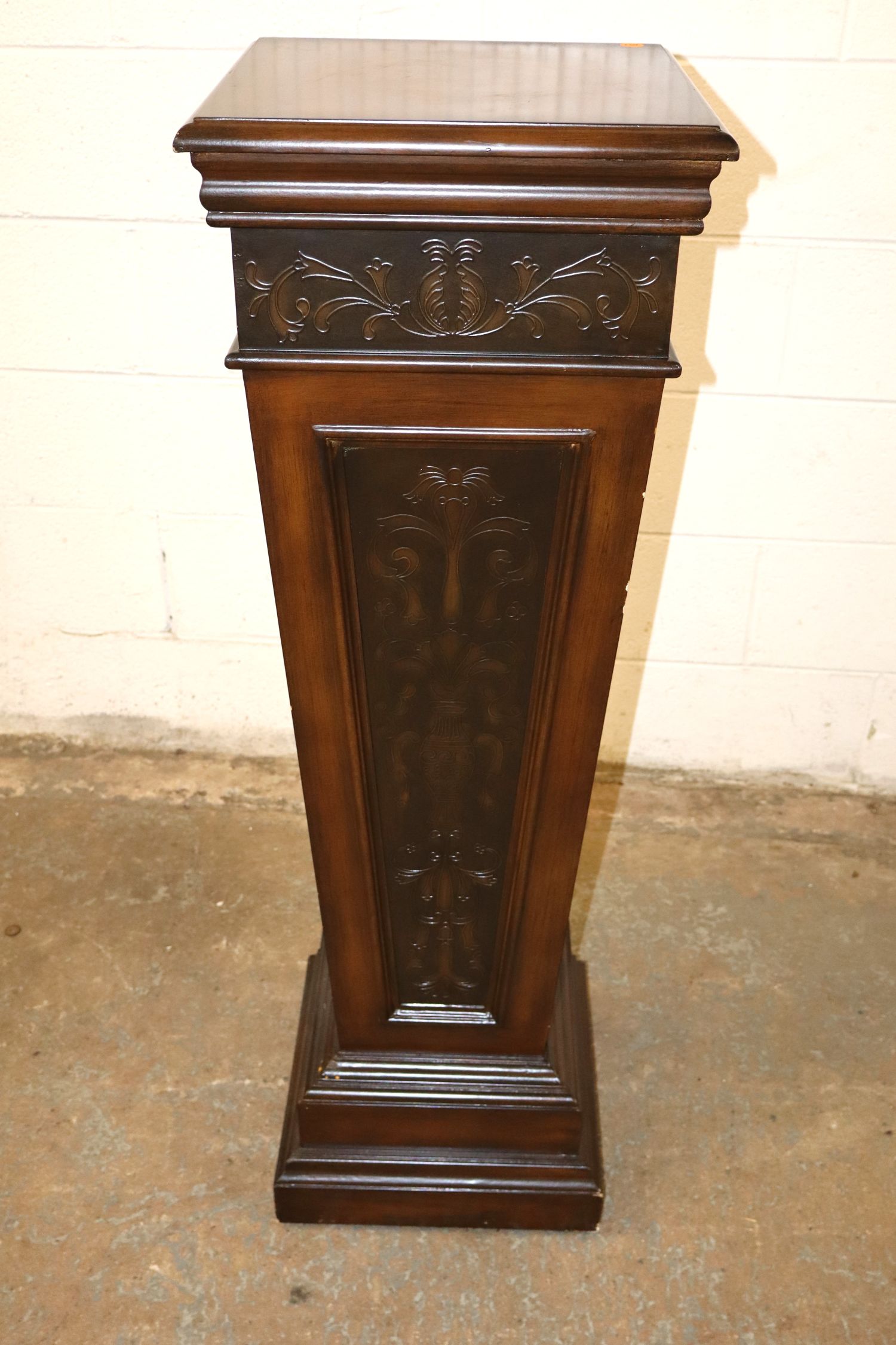 Mahogany pedestal with stamped decoration accents