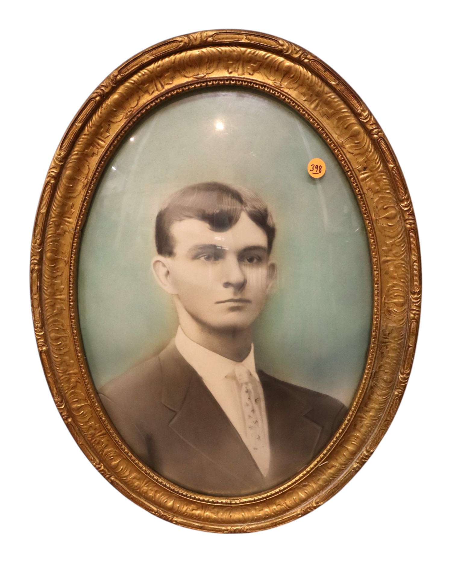 Antique oval convex glass portrait in frame