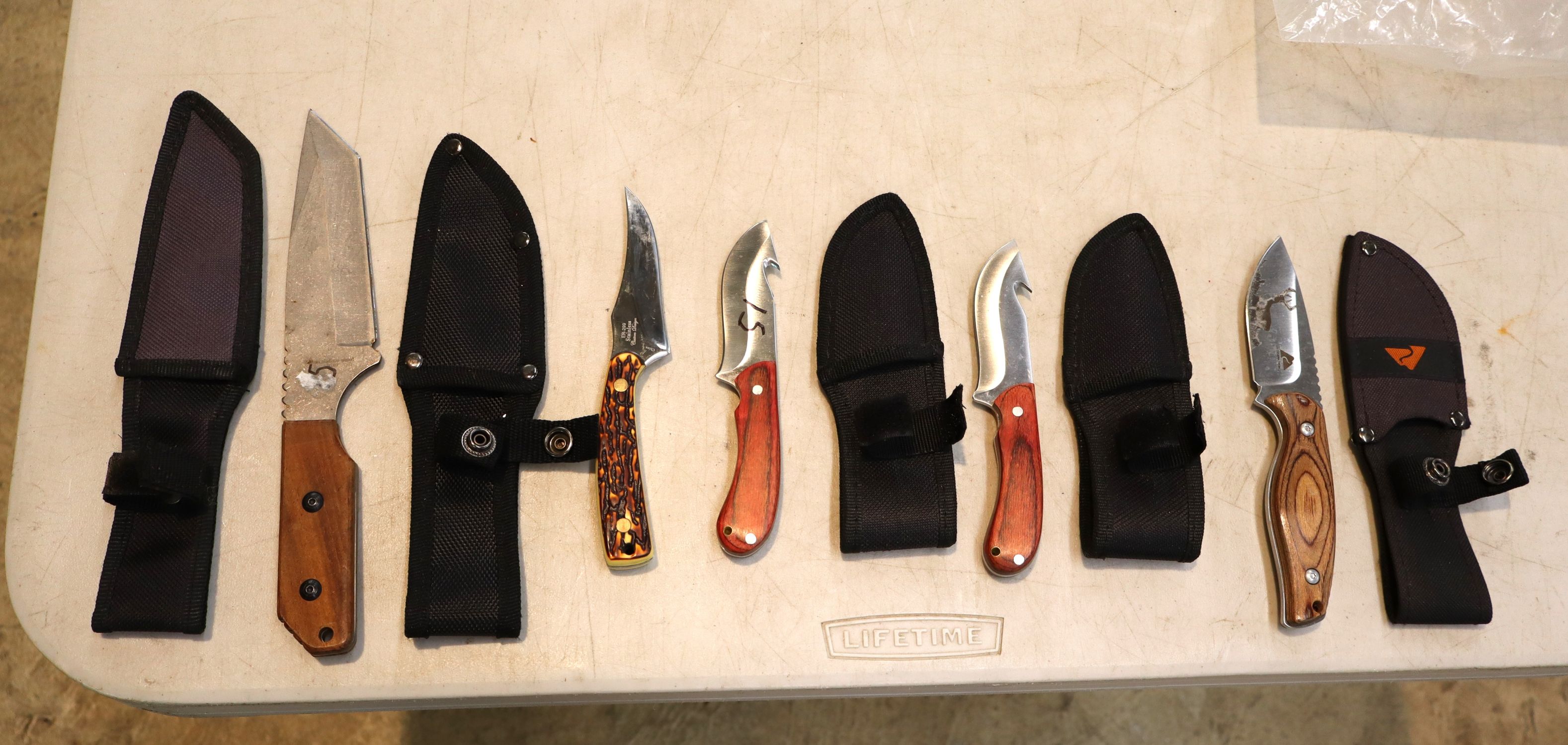 5 knives with sheaths