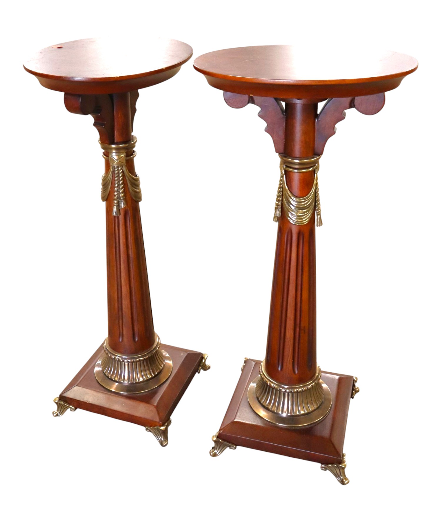 PR oval mahogany pedestal tables with bronze accents