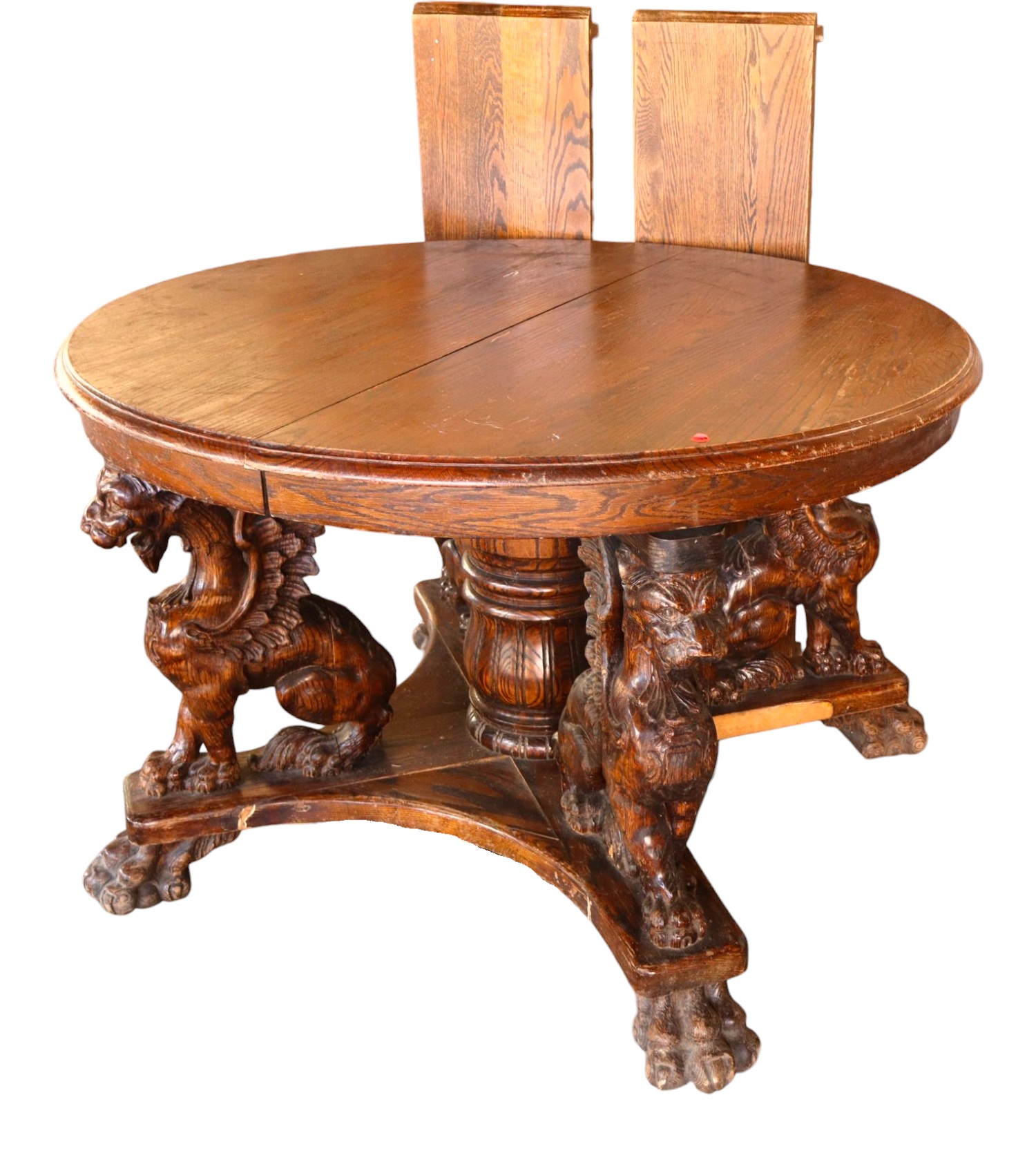 Antique style oak wing griffin 48" dining table w/2 leaves