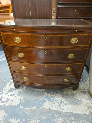 Baker Furniture Bow Front Banded Top Four Drawer Bachelor Chest. A single serpentine or 