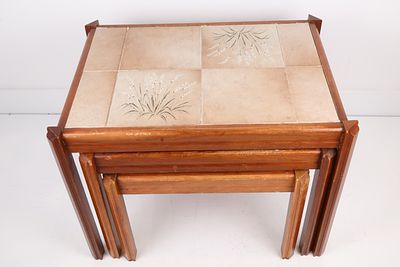 Set of Three Mid-Century Modern Tile-Topped Nesting Tables. A set of three Mid-Century Modern 