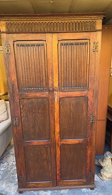 Antique Jacobean Revival Tiger Oak Double Wardrobe Armoire. A single large wardrobe or armoire 