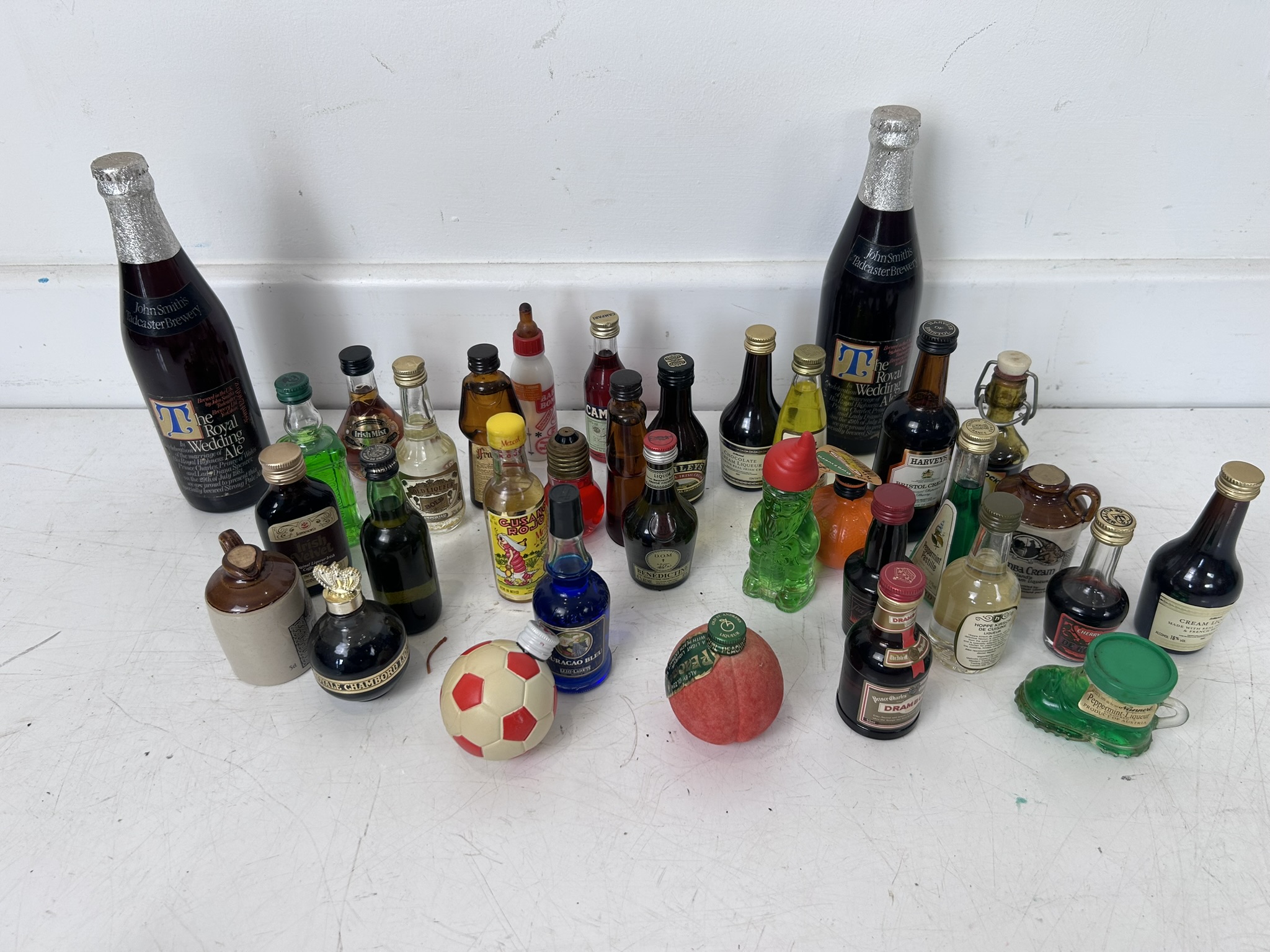 Good collection of over 30 collectable miniature bottles of liqueurs and others, some sought after examples and two bottles of original Royal Wedding Ale in sealed bottles