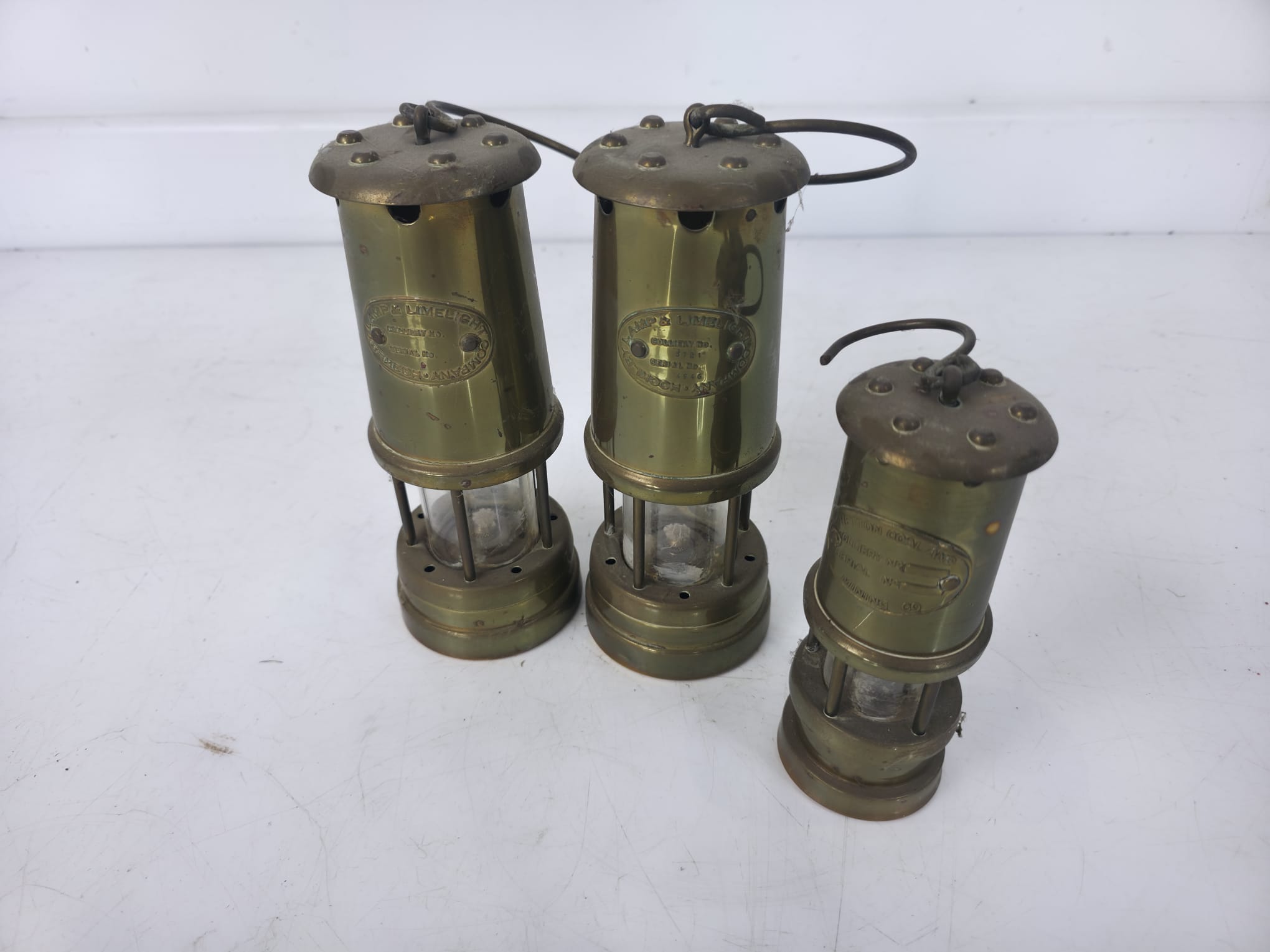 Three Vintage Brass Miner's Safety Lamps