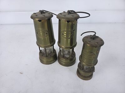 Three Vintage Brass Miner's Safety Lamps. Collection of three vintage brass miner's safety lamps 