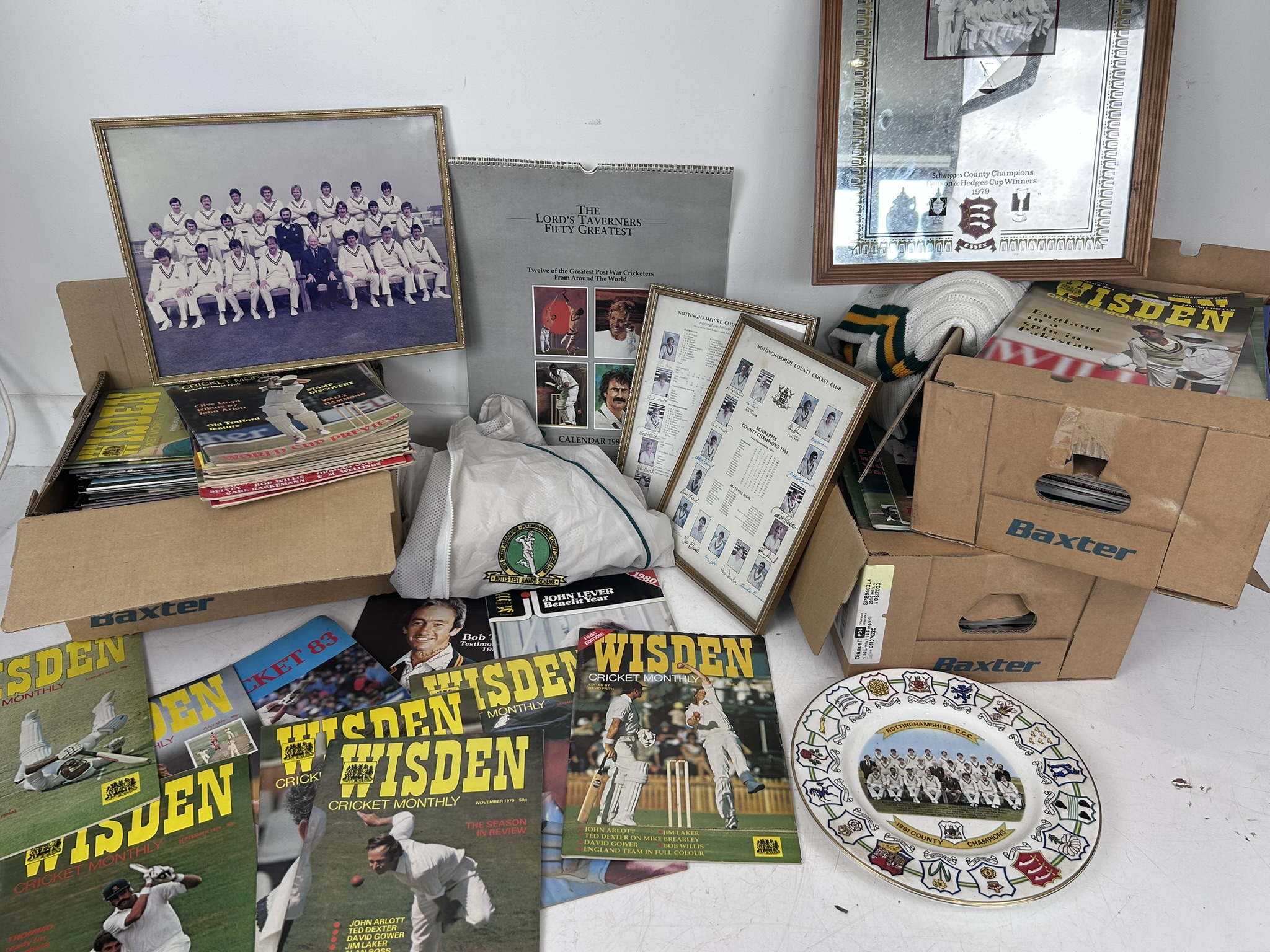 A good Cricketers mixed lot comprising of a substantial collection of Wisden Cricket monthly, including the very first edition, along with clothing, calendar, signed magazines and other signed memorabilia and vintage cricket club items for Nottinghamshire