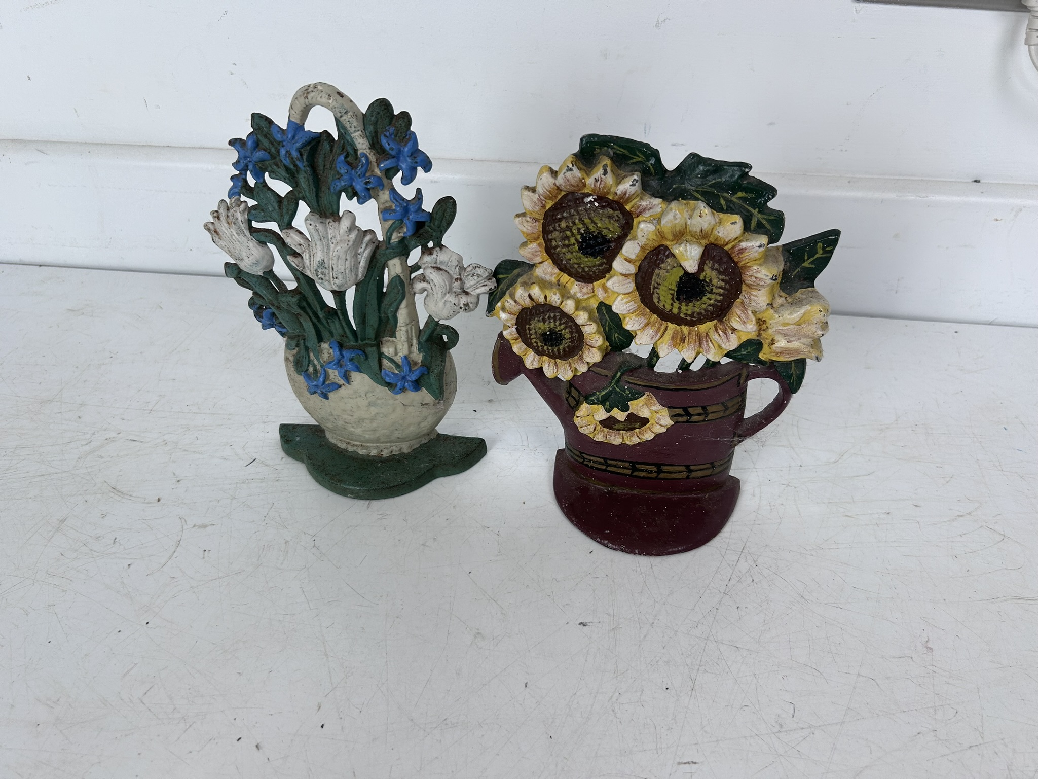 Pair of cast iron door stops