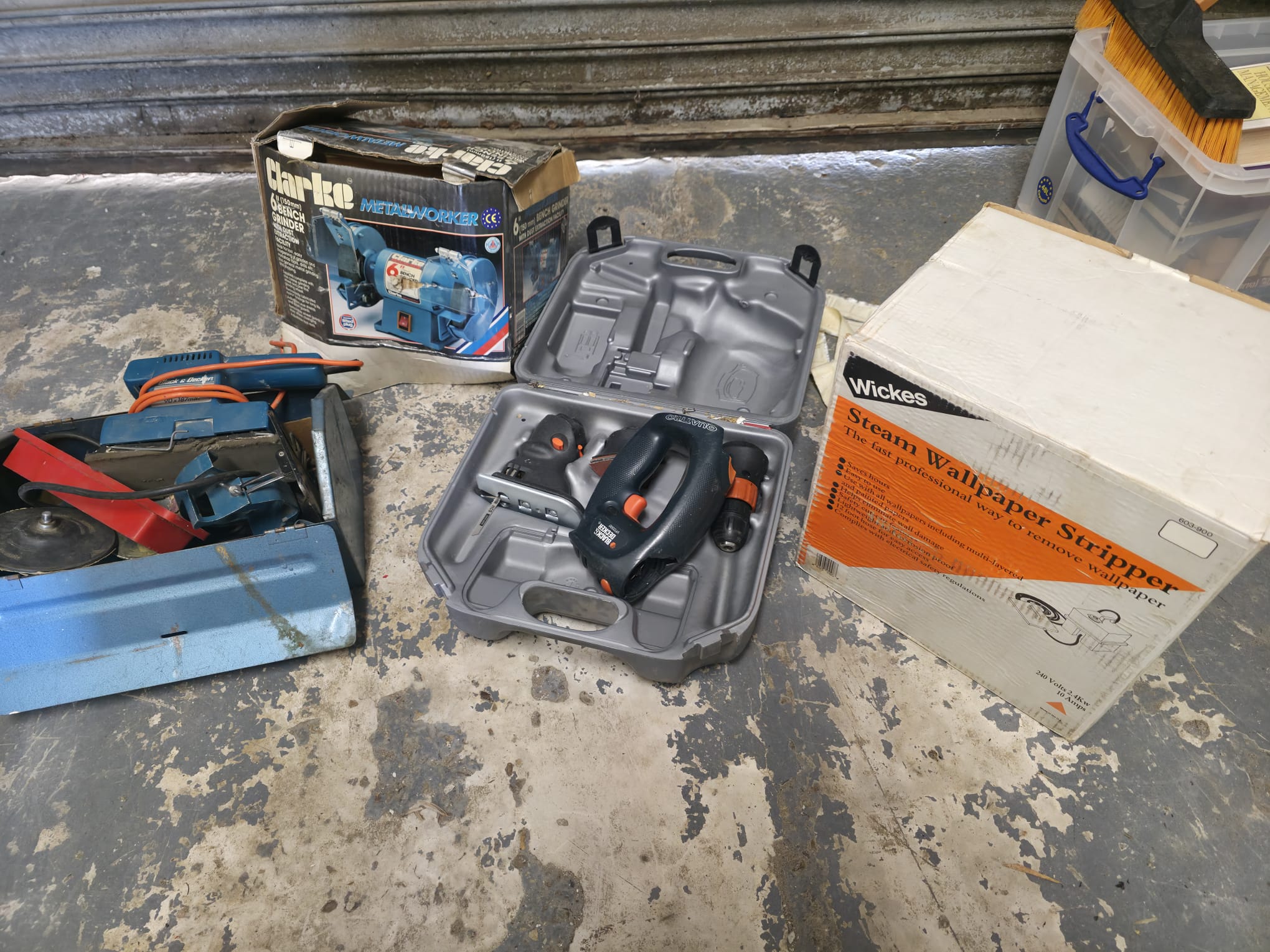 Assorted Power Tools and a metal toolbox with contents