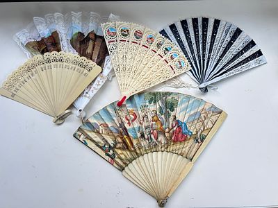 A collection of antique and vintage hand fans. Central example likely continental Europe and 