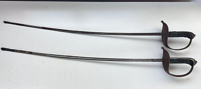 A pair of British Army 1864 Pattern, gymnasia / practise swords. Some corrosion to hilt and blade