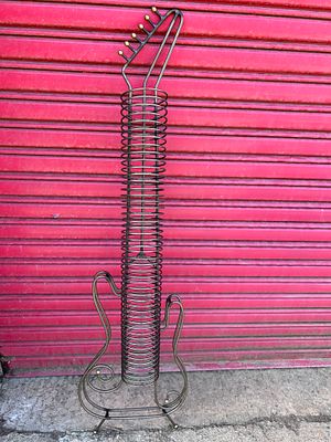 Quality metal CD/DVD rack in the form of guitar
