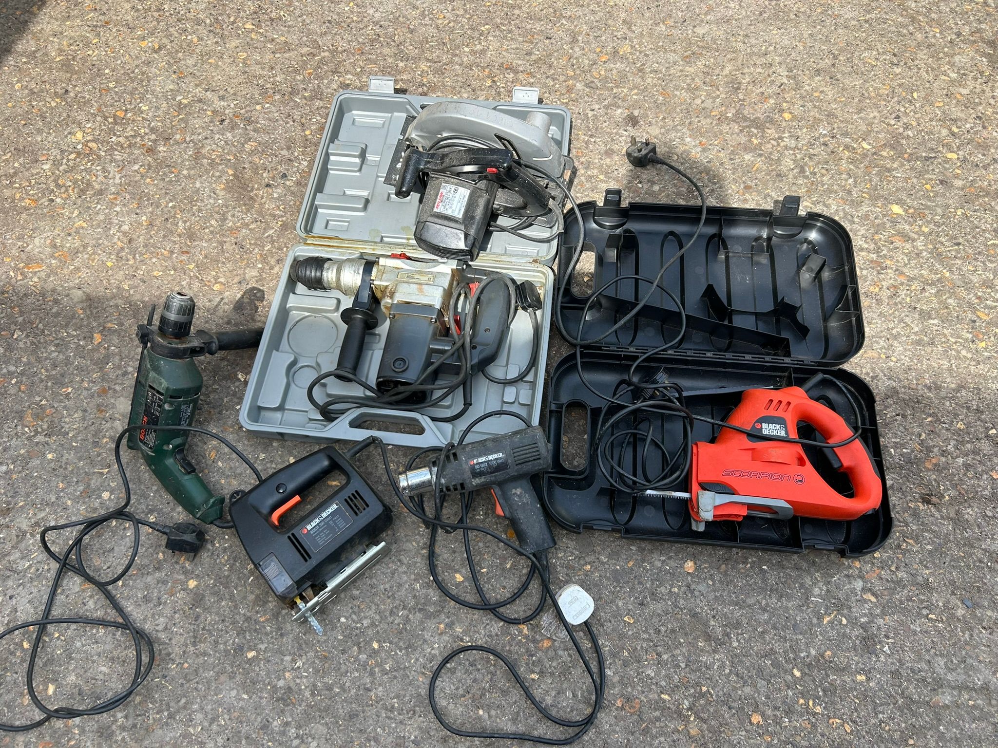 A collection of six power tools, including two Drills (1 Bosch), Saw, Jigsaw, Scorpion Multi-Function Saw, Black & Decker etc - All working