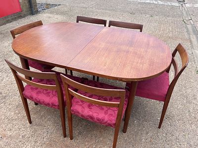 Charming Nils Jonsson by Troeds extending double leaf dining table with six matching chairs. 