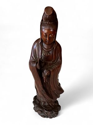 Chinese Carved Hardwood Figure of Guanyin, Mid-20th Century. Graceful carved hardwood figure of 