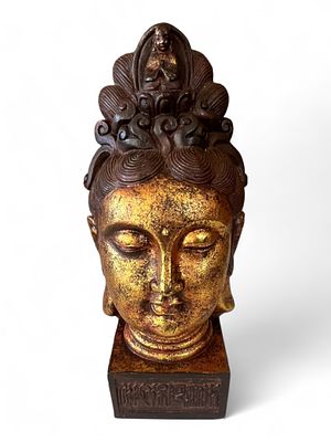Chinese Gilt and Lacquered Wood Head of Guanyin, 20th Century. Impressive carved wood head of 