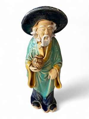 Pair Chinese Sancai-Glazed Pottery Elders, Early to Mid-20th Century. A pair of charming Chinese 