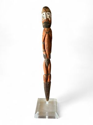 Carved Tribal Male Ancestor Figure, Papua New Guinea, mid-20th century. Slender hand-carved 