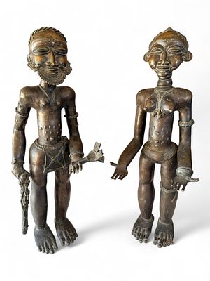 Pair of Large West African Bronze Figures, Yoruba or Benin Style, mid-20th century. A striking 