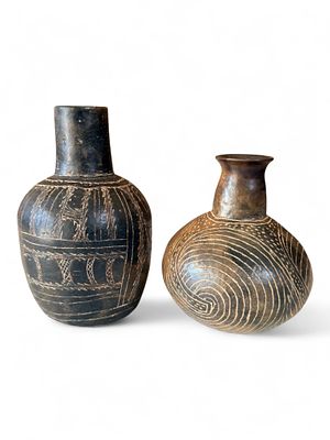 Pair of West African Incised Blackware Vessels, Mid-20th Century. Two complementary hand-coiled 