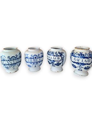 Set of Four Continental Delft-Style Apothecary Jars, 19th Century. A fine matched set of four 