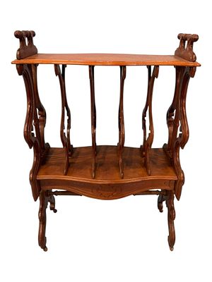 Victorian Walnut Canterbury, Circa 1870. A finely carved Victorian walnut canterbury featuring a 