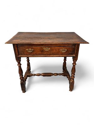 English Oak Tavern or Writing Table, early 18th century. A well-patinated English oak tavern or 