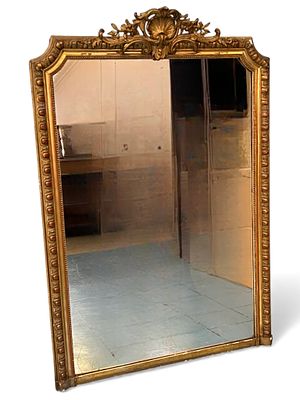 Large French Louis XVI Style Giltwood Mirror, Early 20th Century. A grand Louis XVI style carved 