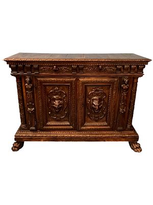 Large Continental Renaissance Revival Carved Oak Sideboard, Late 19th Century. A large 