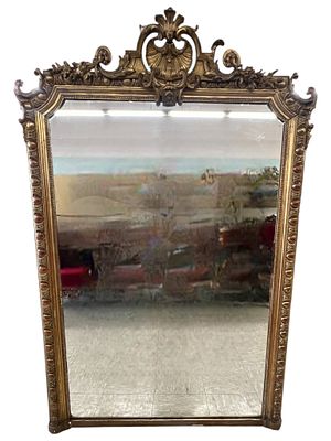 Monumental French Rococo-Style Giltwood Floor Mirror, 19th Century. A magnificent and 