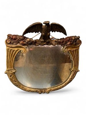 19th Century American Carved and Giltwood Mirror with Eagle Crest. Oval giltwood mirror 