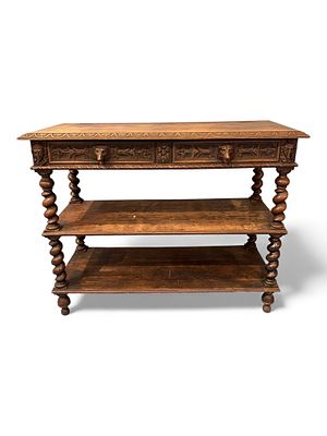 Continental Carved Oak Renaissance-Revival Server, Late 19th Century. A boldly carved 