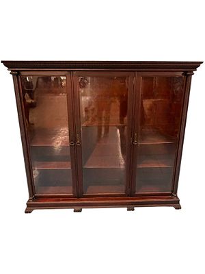 Large Mahogany Three-Door Bookcase, Late 19th Century. A stately late 19th-century mahogany 