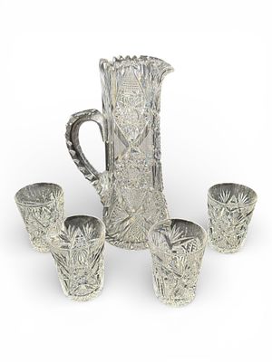 Brilliant Period Cut Glass Water Pitcher and Four Tumblers. A finely executed American Brilliant 