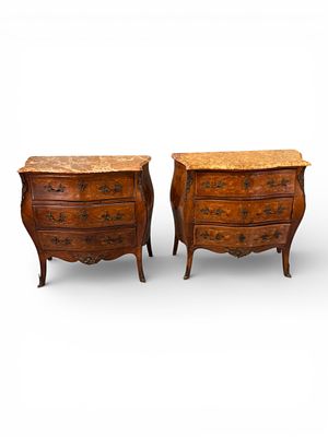Pair of French Louis XV Style Marble-Top Commodes. A near pair of French Louis XV style commodes 