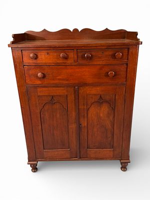 Walnut Primitive Jelly Cupboard with Three-Drawer Top and Scalloped Backsplash. A handsome and 