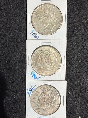 Three (3) Peace Silver Dollars 1921, 1925, 1926 Philadelphia Mint .900 Fine Silver. Group of 