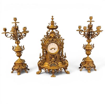 Three-Piece Gilt Brass Garniture Clock Set. Three-piece gilt brass garniture clock set, late 
