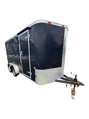 2016 Cargo Craft Enclosed Tandem-Axle Cargo Trailer. Black enclosed cargo trailer manufactured 