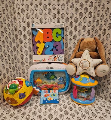 Baby play time. Interactive play time, a crinkle number book, bath time letters and a soft bunny.