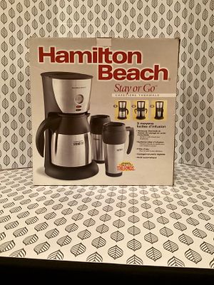 Coffee maker. Hamilton beach stay or go coffee maker w/to go mugs