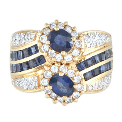 11. Ring with double sapphires and diamonds rosette. 18kt yellow gold. Oval and princess cut 