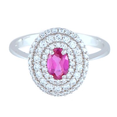 32. Ring with ruby and zircons rosette. 18kt white gold. Oval cut ruby. Size: 13/53.