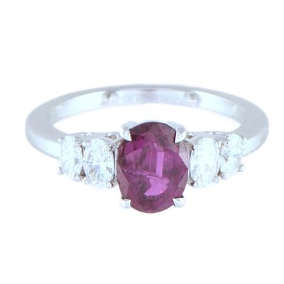 44. Ruby and diamonds ring. Made in 18kt white gold, with a central Siam-coloured marquise cut 