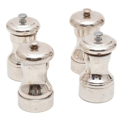 14. Set of two pepper shakers and two salt shakers, 20th century. Silver. 9.5 x 5 cm diam.
