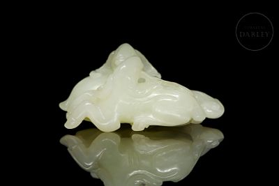 White jade figure ‘Rams’, Qing dynasty. Finely carved white jade with light natural veins 