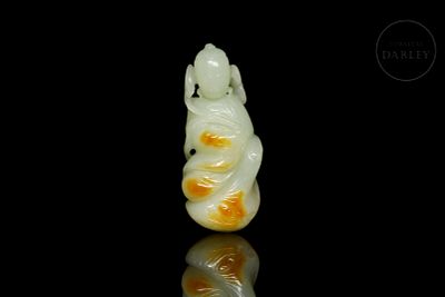 Carved jade figure, ‘Figure with Branch,’ Qing dynasty. The piece, crafted from whitish jade 
