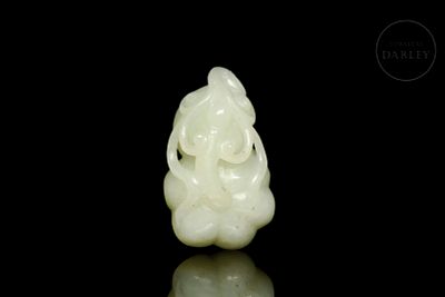 White jade figure ‘Lotus Root’, Qing dynasty. Translucent white jade. Depicts a lotus root 